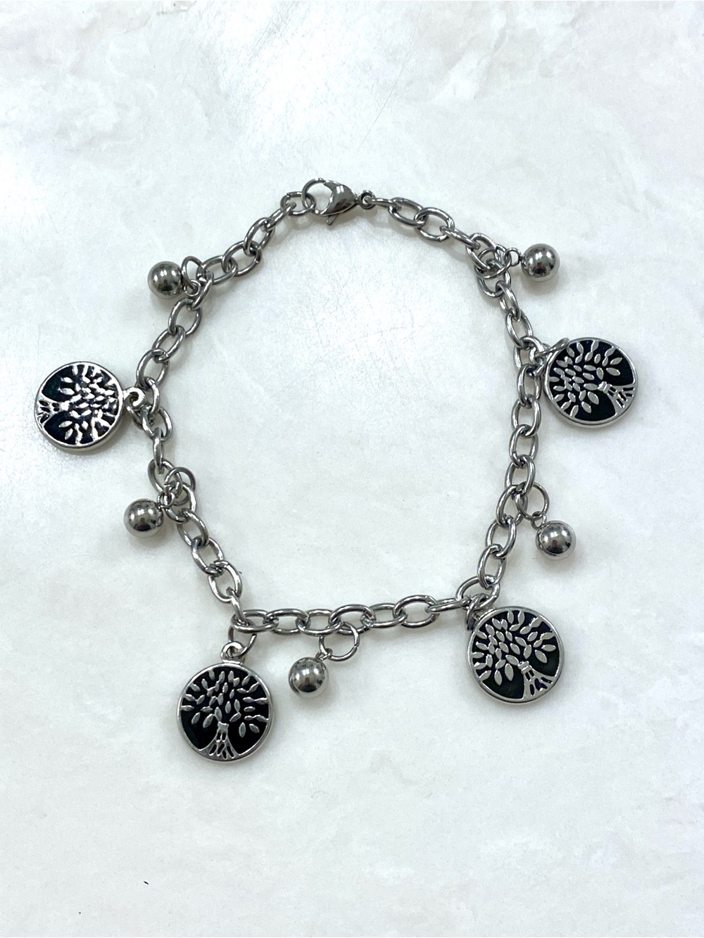 Silver-Tone Tree of Life Charm Bracelet with Black Accents